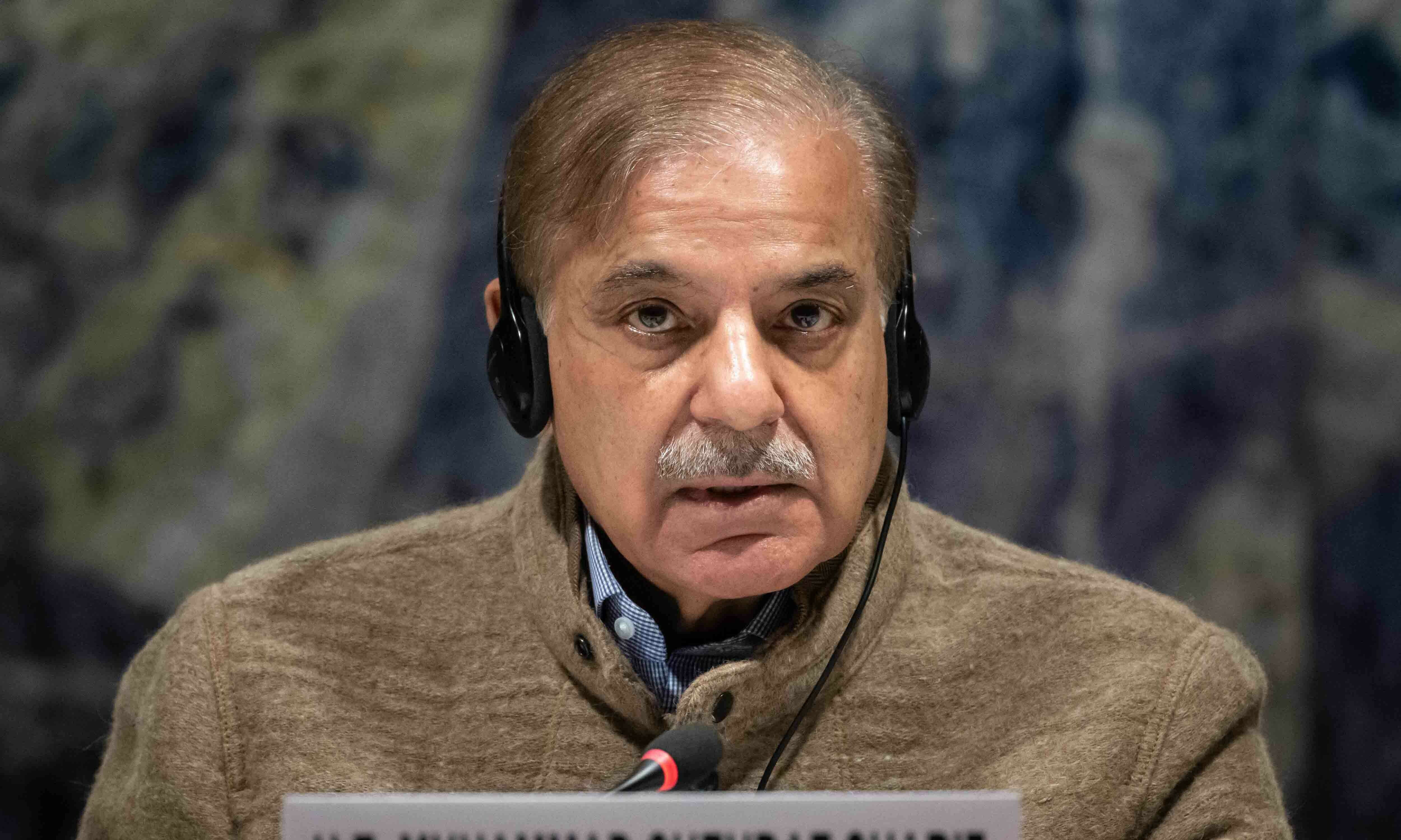 <p>Prime Minister Shehbaz Sharif delivers a speech at the start of a Pakistan’s Resilience to Climate Change conference in Geneva on January 9. — AFP</p>
