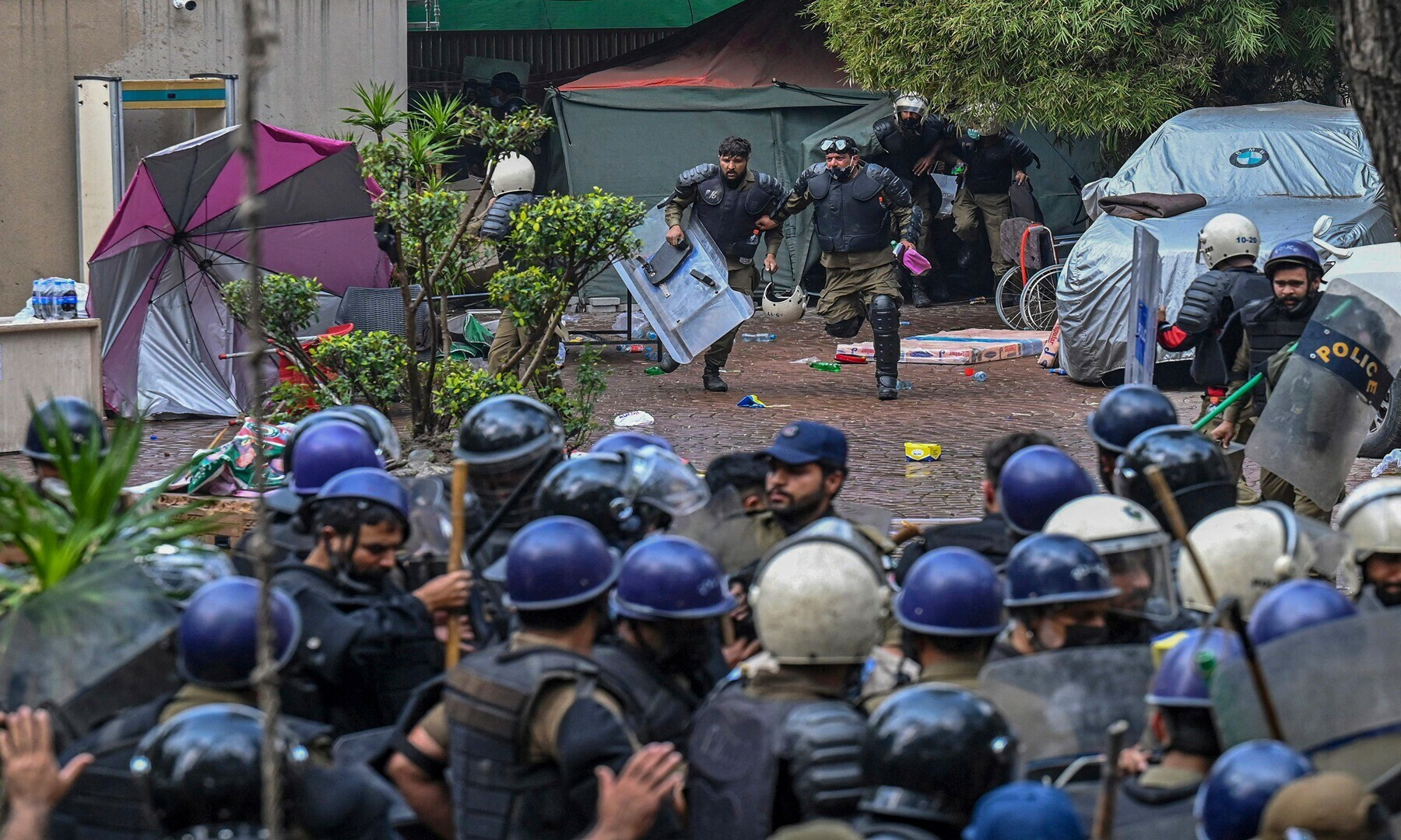 Riot police enter the residence of former Pakistan’s prime minister Imran Khan in Lahore on March 18, 2023, after Khan left for Islamabad to appear in a court.— Photo by Arif Ali/AFP