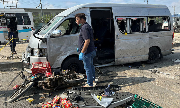 View of a damaged car after a suicide blast in Karachi on April 19, 2024. — Reuters