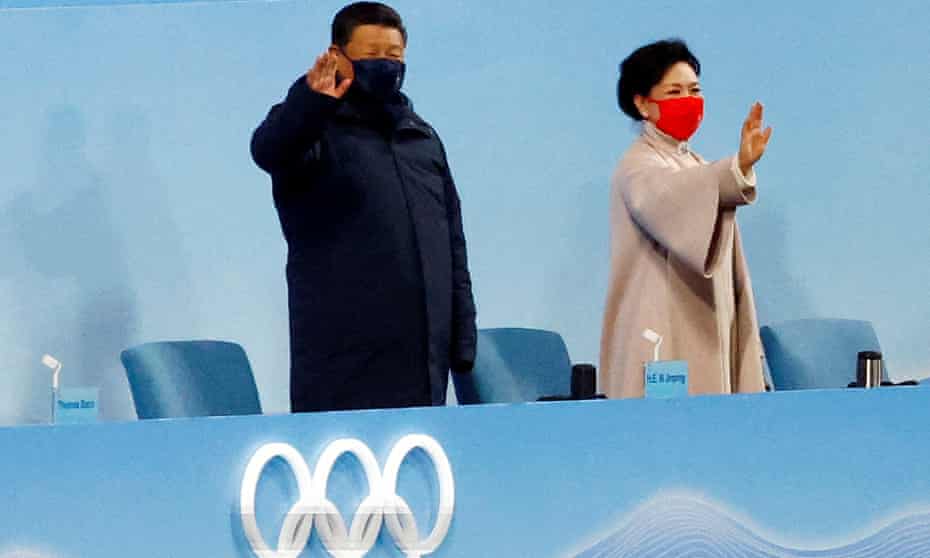 China’s President Xi Jinping waves next to his wife Peng Liyuan at the opening of the Winter Olympics in Beijing on 4 February 2022.