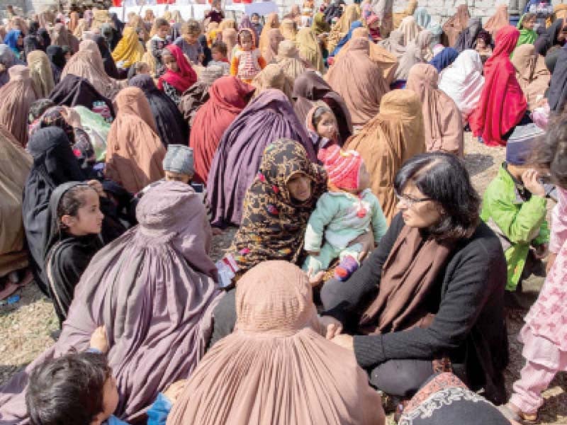 dr sania nishtar speaks to female idps in tirah valley photo nni