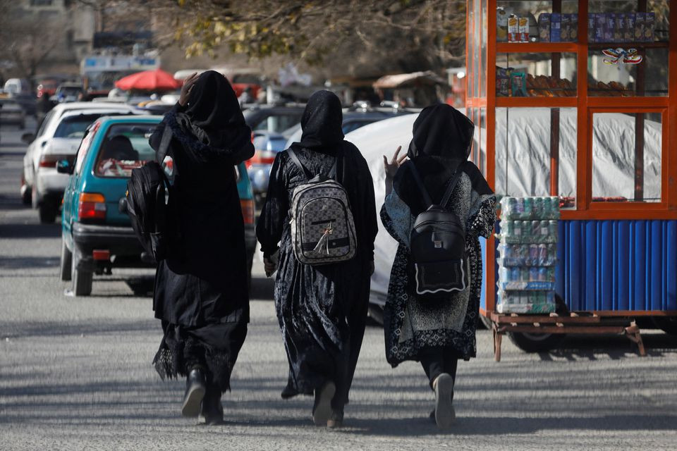 afghan female students walk near kabul university in kabul afghanistan december 21 2022 photo reuters