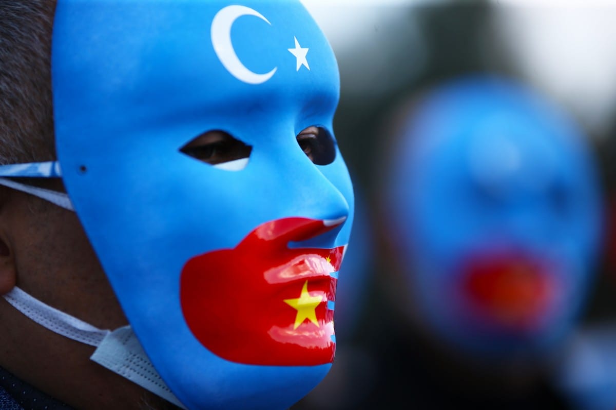 People gather in Turkey to stage a protest against China's policies and human rights violations towards Uyghurs [Eren Bozkurt/Anadolu Agency]