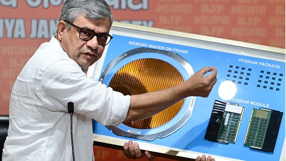 Minister Ashwini Vaishnaw gives a demo of the complex, precision semi-conductor tech that Micron Technology is bringing to India during a press conference at BJP Headquarters in New Delhi on June 26, 2023.