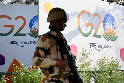 File Photo: A member of India's military force stands guard at the G20 foreign ministers meeting in New Delhi, India March 2, 2023. (Image: Reuters)