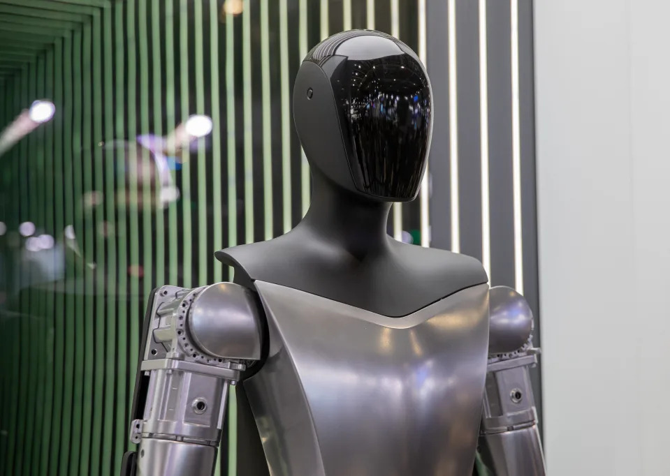 A close up photo of Tesla's Optimus humanoid robot