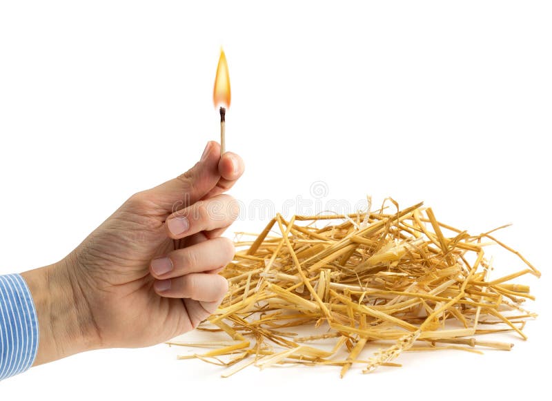 fire-hazard-hand-holding-burning-matchstick-near-haystack-36615596.jpg