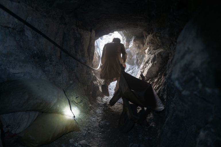 Miners work deep inside a Tourmaline min in the Pech Valley, Kunar Province.