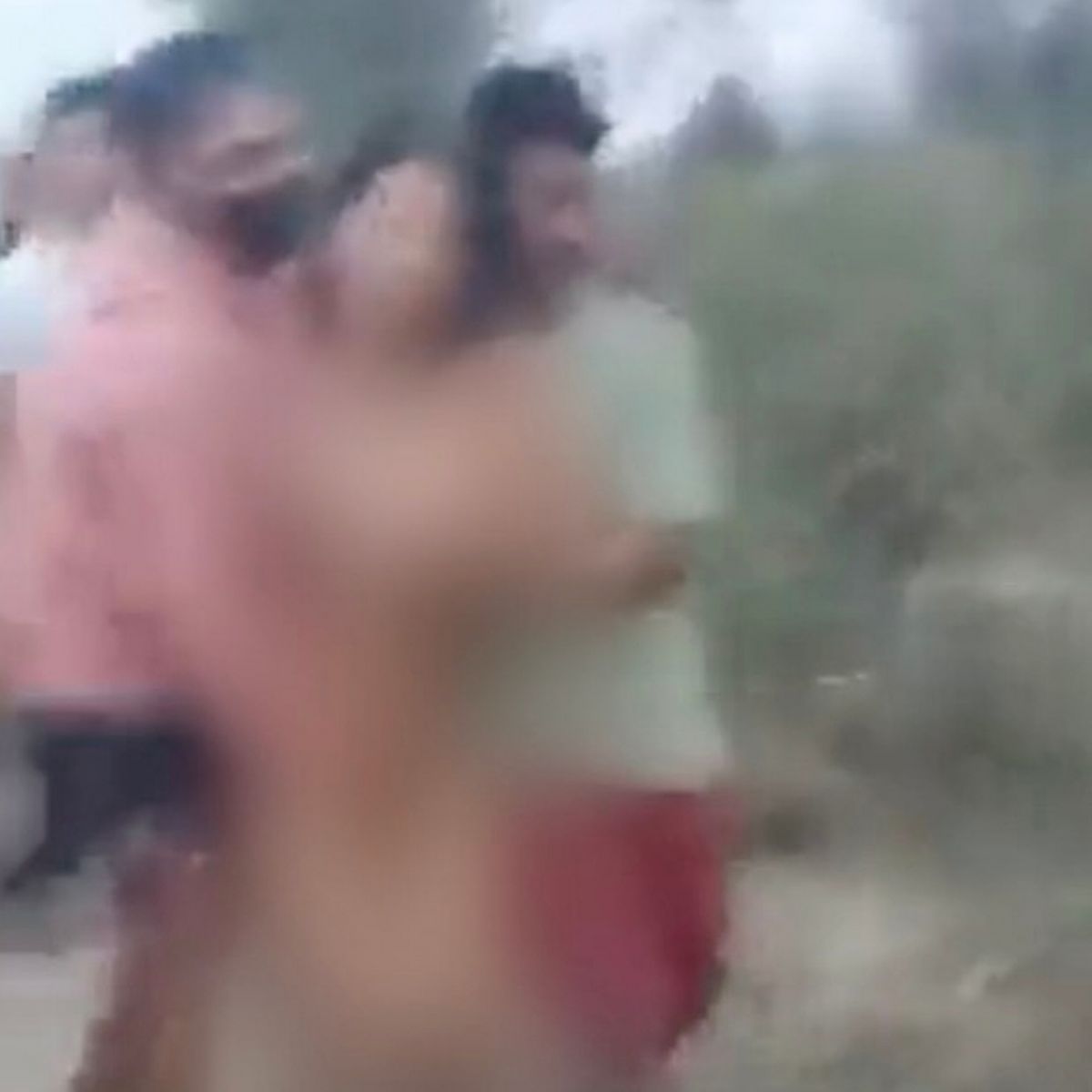 0_PAY-Outrage-across-India-over-horror-footage-of-women-being-paraded-naked-through-crowd-of-g...jpg