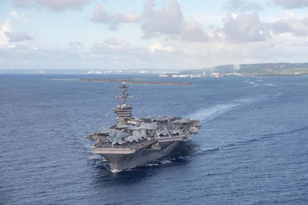 0_US-Navy-Aircraft-Carrier-USS-Theodore-Roosevelt-Departs-Guam.jpg