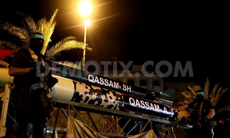 1436405894-palestinian-hamas-militants-march-during-antiisrael-rally-in-gaza_8061598[1].jpg