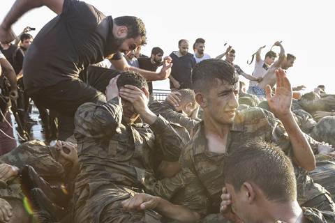 160716-world-turkey-anger-soldiers-kick-0556_b7dfa1104456478e14e5666c33420274.nbcnews-fp-480-320.jpg