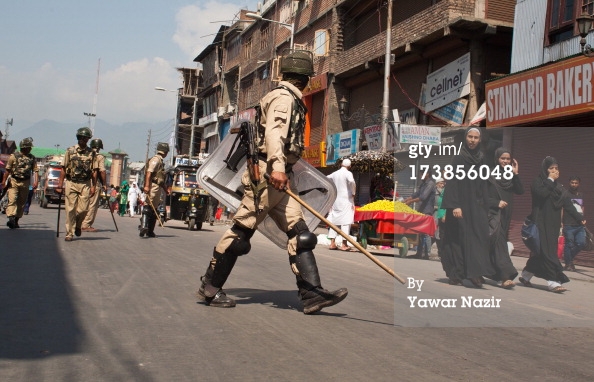 173856048-indian-paramilitary-forces-patrol-the-street-gettyimages.jpeg