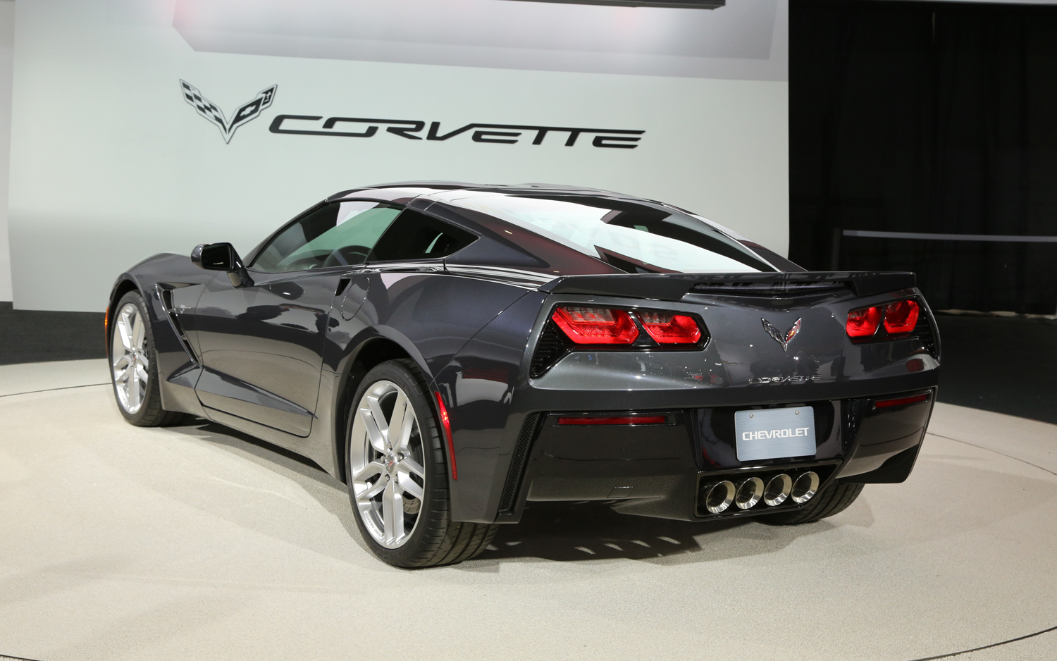 2014-Chevrolet-Corvette-Stingray-rear-three-quarters.jpg