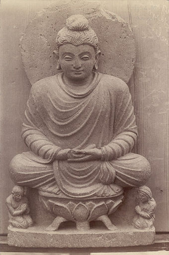 340px-Statue_of_a_Buddha_seated_on_a_lotus_throne_in_Swat_Valley.jpg