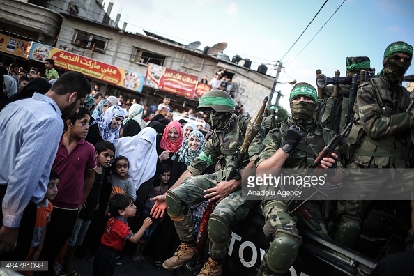 484781098-members-of-ezzedin-al-qassam-brigades-the-gettyimages[1].jpg