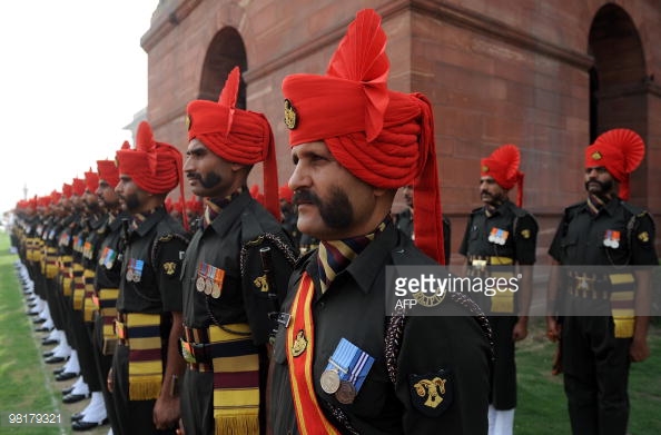 98179321-rajput-regiment-personnel-stand-guard-waiting-gettyimages.jpg