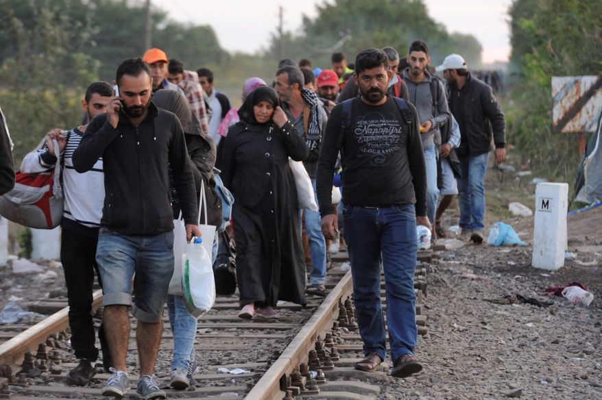 9_8_2015_hungary-migrants-48201_s878x584.jpg