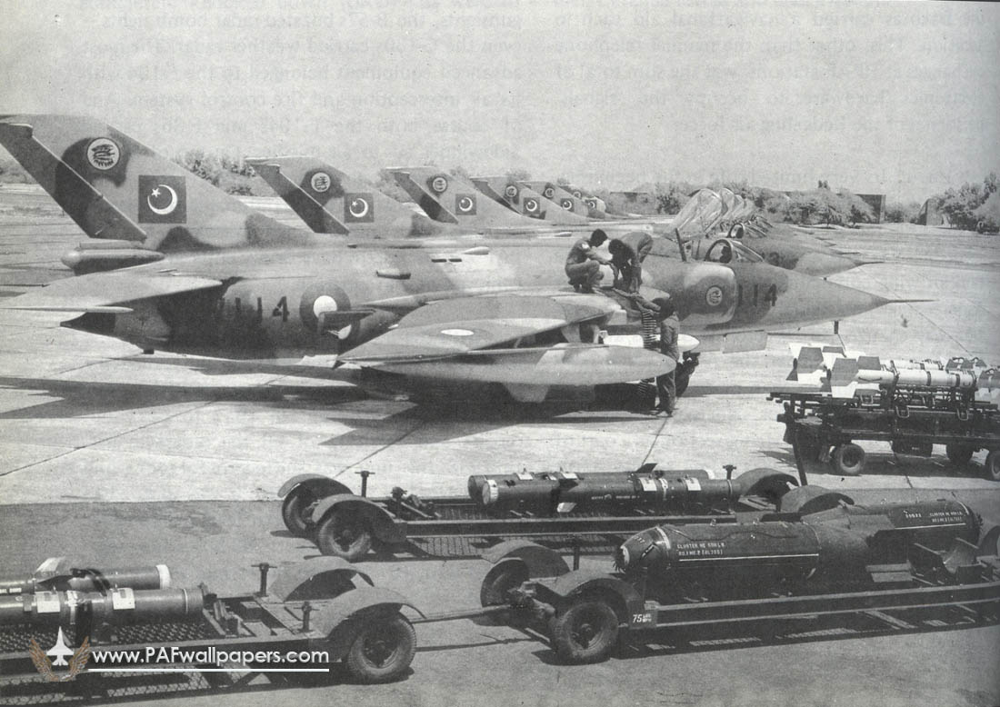 A-5 being loaded with HAFR-2 anti-runway bombs...jpg