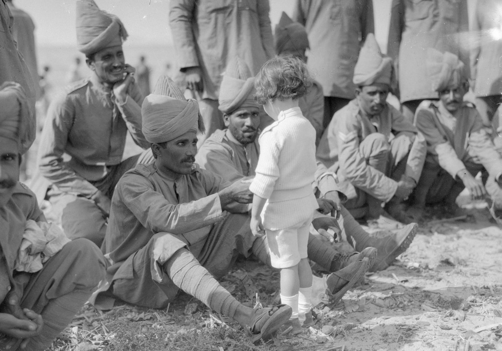 A French boy introduces himself to Indian soldiers .jpg