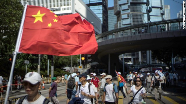 A group of pro-China protesters marches in downtown.jpg