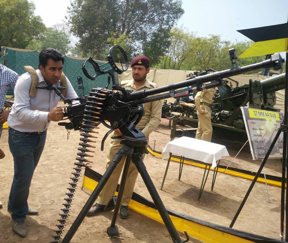 a-journalist-trying-to-control-Anti-Aircraft-Gun-in-the-defence-exhibition.jpg