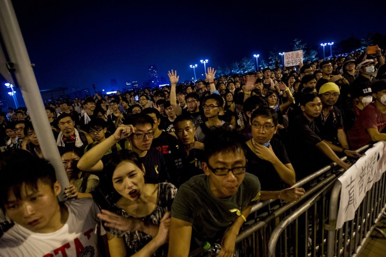 A large crowd of protesters gathered around Hong Kong’s main government offices.jpg