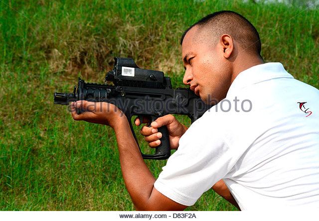 an-indian-commando-aiming-x-95-gun-d83f2a.jpg
