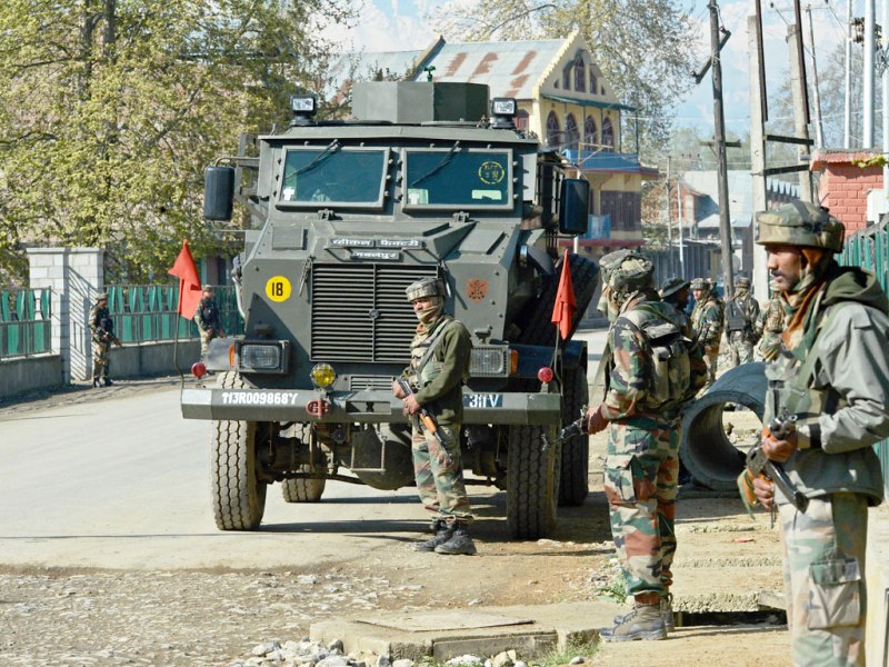 Army-officers-patrol-near-a-polling-station-in-Bijbehara-some-42kms-south-of-Srinagar.-AFP-photo.jpg