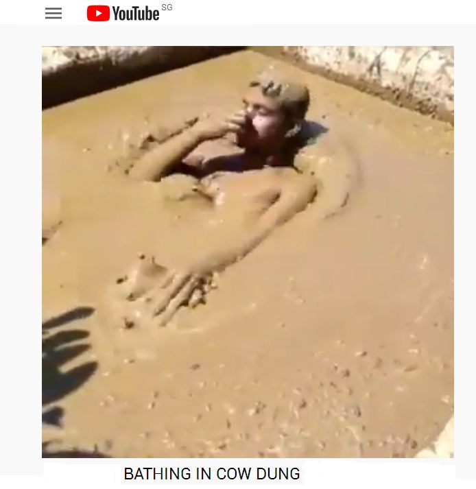BATHING IN COW DUNG3.jpg