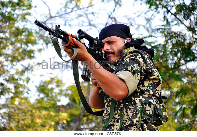 border-security-personnel-with-gun-guarding-india-pakistan-border-c3e37k.jpg