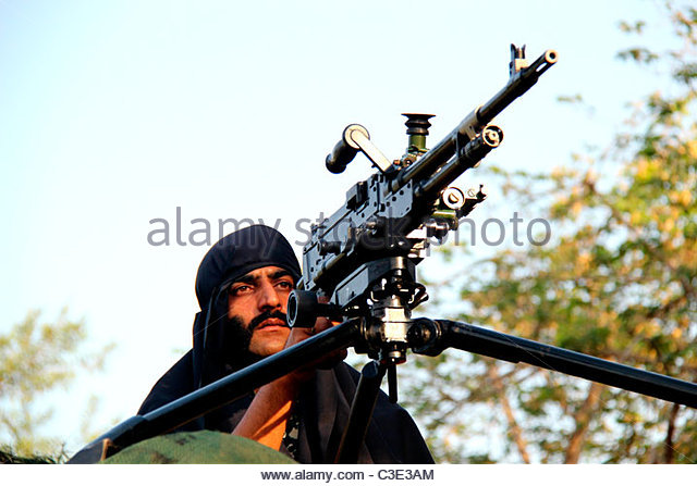 border-security-personnel-with-gun-guarding-india-pakistan-border-c3e3am.jpg
