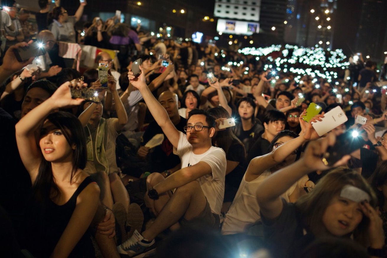 Demonstrators listened to pro-democracy speeches on Saturday.jpg