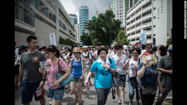 Demonstrators walked through downtown Hong Kong..jpg
