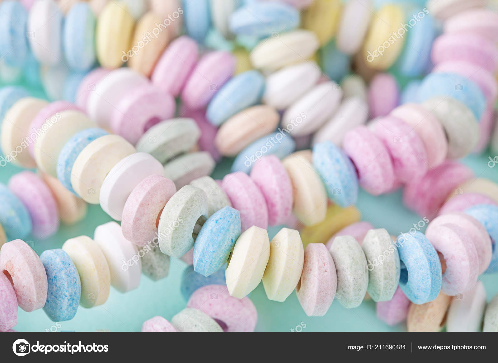 depositphotos_211690484-stock-photo-candy-necklace-blue-pastel-colored.jpg