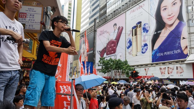 During the march, Joshua Wong, 17, the founder of pro-democracy student group.jpg