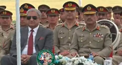 general-r-bajwa-sitting-next-to-coas-general-asim-munir-in-yaum-e-takreem-e-shuhda-ceremony.jpg
