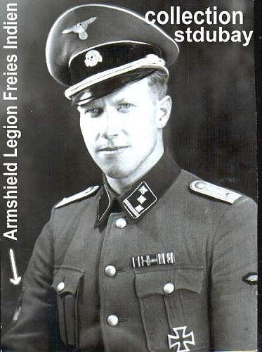 German officer in SS Uniform with Armshield o the Legion.jpg
