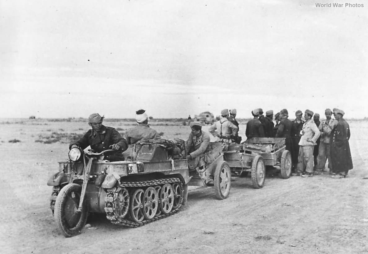 Italian_soldiers_ride_SdKfz_2_to_surrender_to_British_in_Egypt_42.jpg