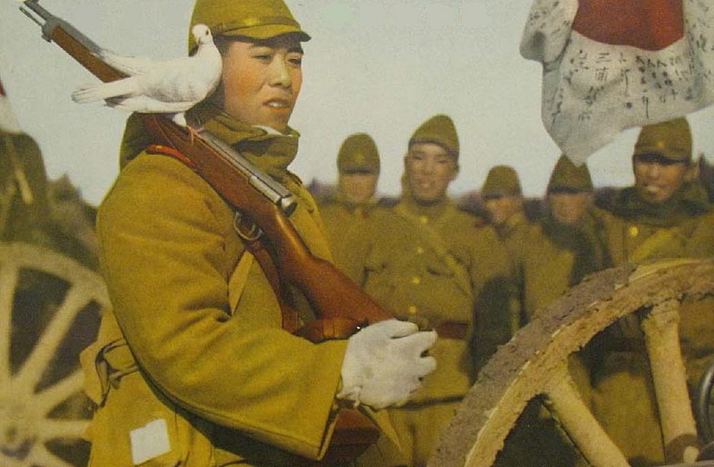japanese+soldier+with+a+white+bird+on+his+arisaka+rifle[1].jpg