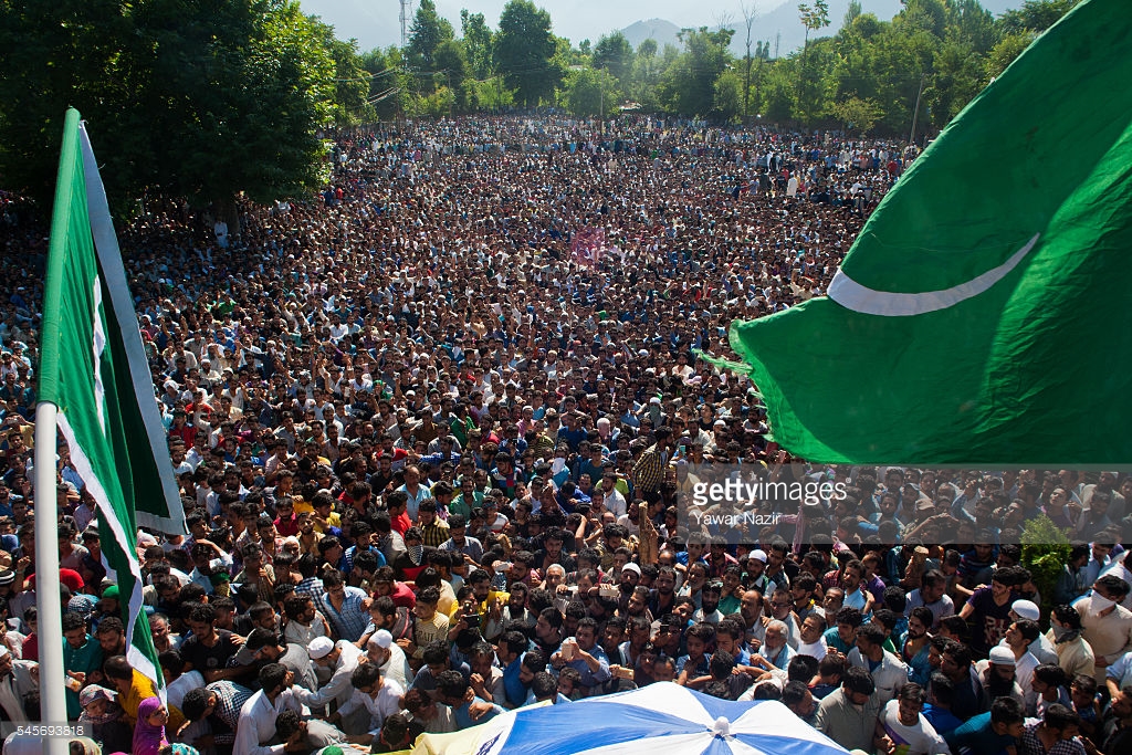 kashmiri-muslims-attend-the-funeral-of-burhan-muzaffar-wani-a-top-picture-id545693818.jpeg