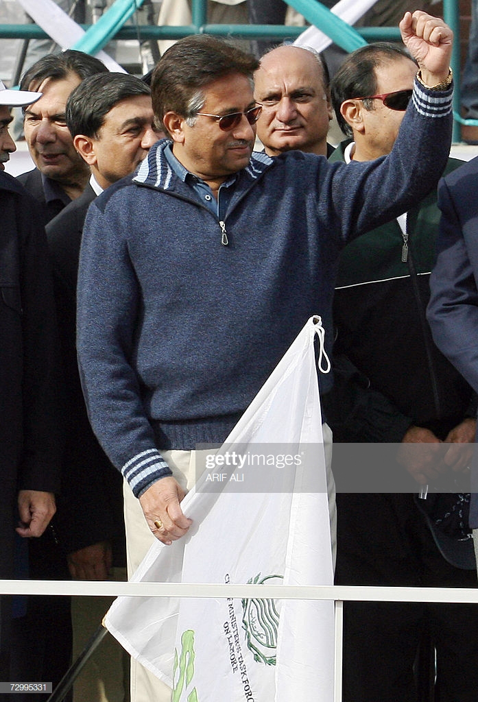 lahore-pakistan-pakistani-president-pervez-musharraf-raises-a-fist-picture-id72995331.jpg