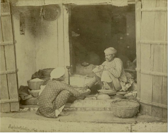 Man Selling Various Products in a Shop - Delhi Circa 1862.jpg