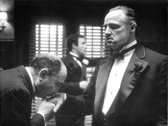 marlon-brando-in-the-godfather-at-his-daughter-s-wedding-hand-kiss_u-L-Q116XI40.jpg