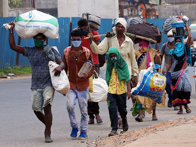 Migrants-workers-walk-along-the-national-highway-for-their-native-places--Chhatisgarh--during-...jpg