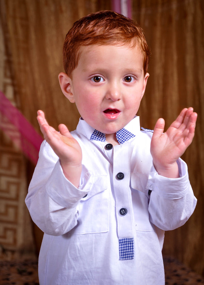 Pakistani red head kid by Mian Rabbani at 500px.com.jpg