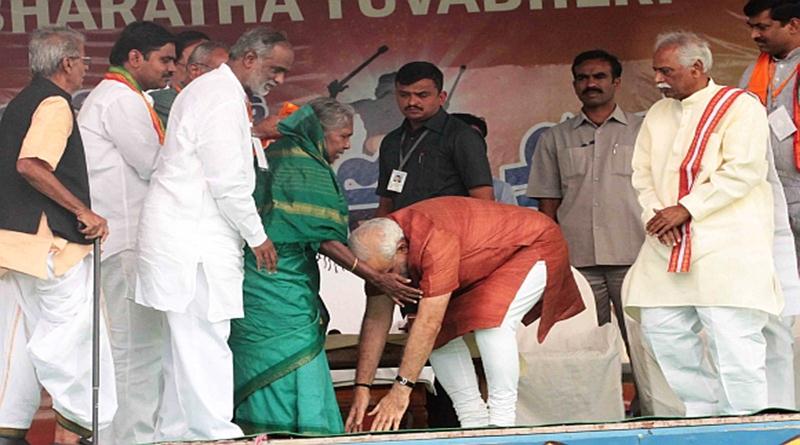 Pictures-of-Prime-Minister-Narendra-Modi-touching-feet-of-elders-as-a-respect-5.jpg