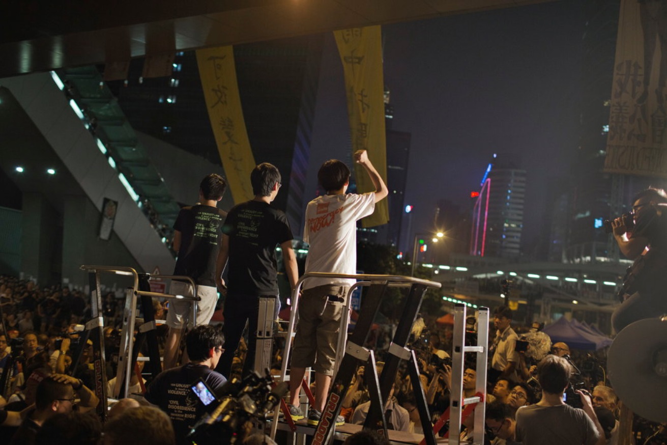 Pro-democracy protesters in Hong Kong held one of the largest rallies of their campaign Saturday.jpg