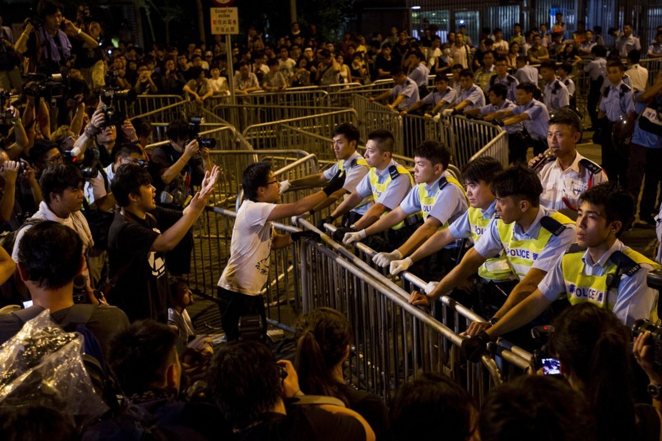 Protesters confronted the police outside Hong Kong’s Legislative Council on Thursday..jpg