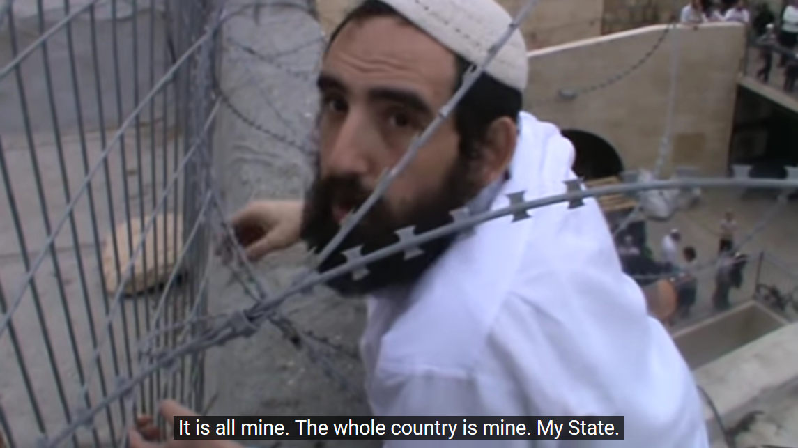 Screenshot_2023-02-27 Hebron - Settler attempts to take down Palestinian flag, 2014 - YouTube(1).png